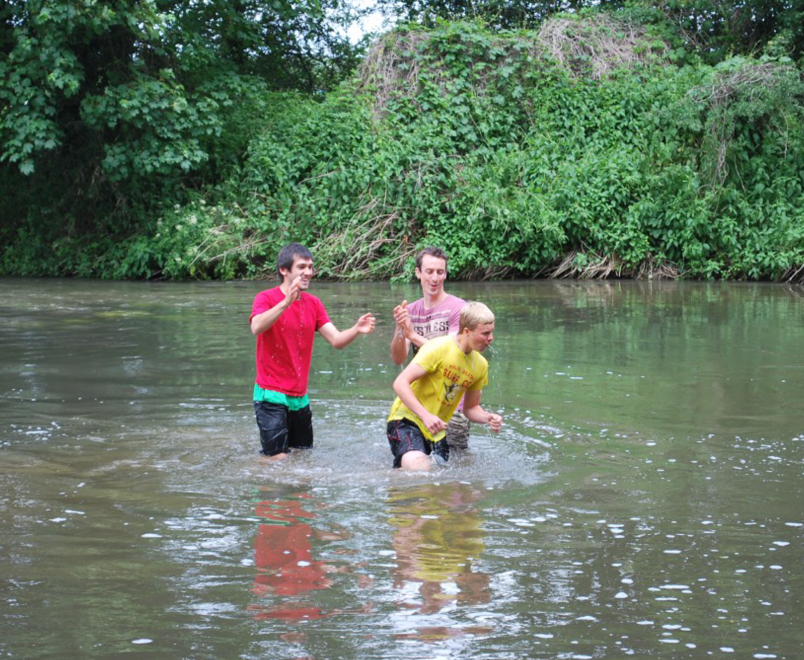 people playing in river